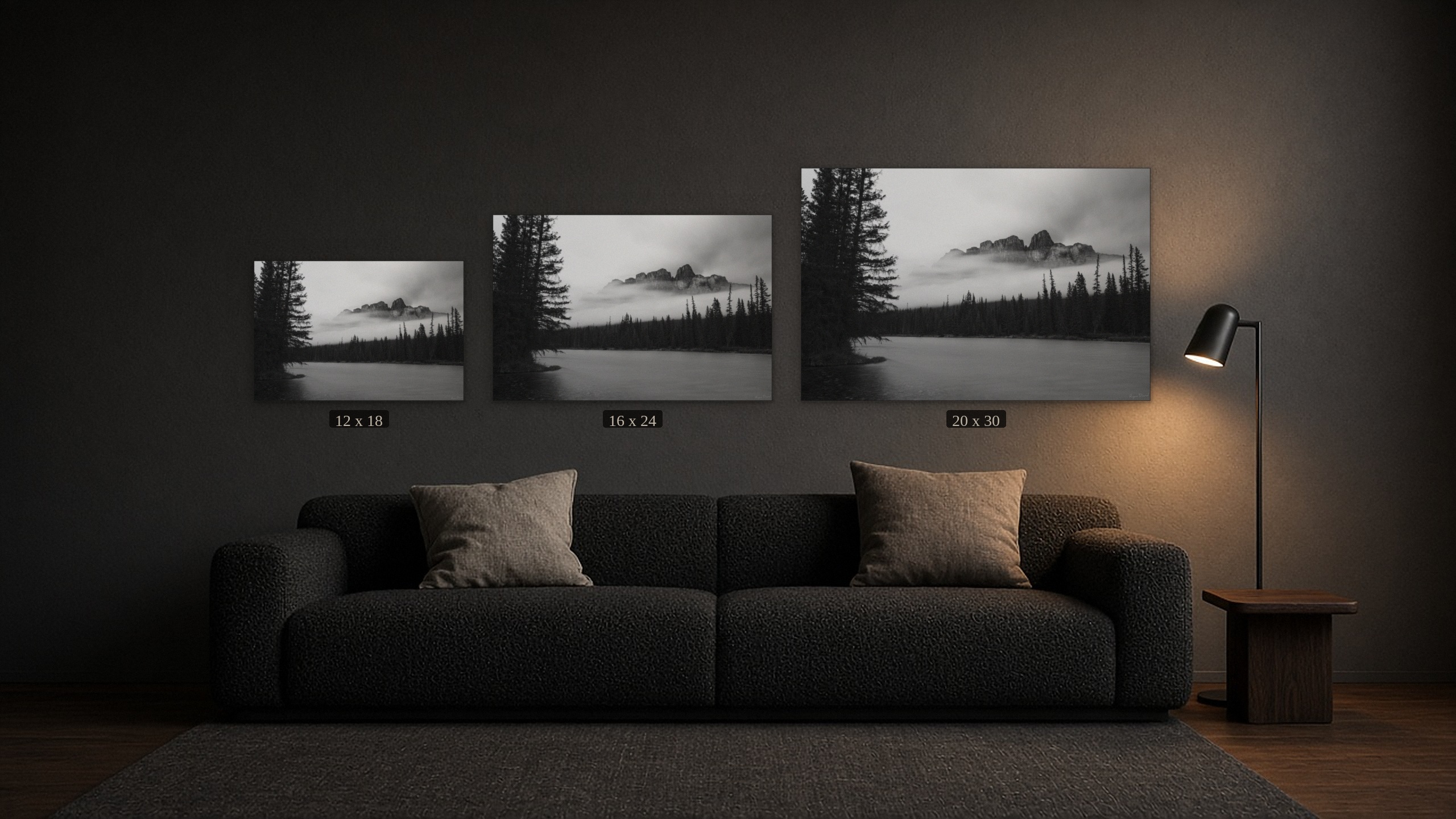 Castle in the Clouds shown in three sizes, 12 x 18, 16 x 24 and 20 x 30 inches, centred above a black sofa.